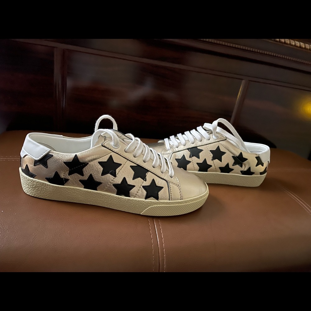 Saint Laurent sneakers. Gold and black stars.